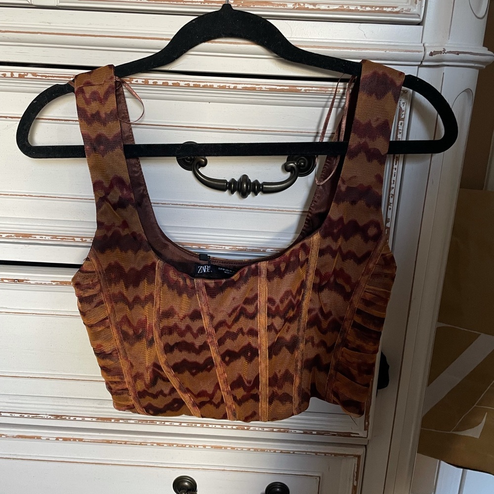 Brand new! Never worn. Size medium brown crop top corset